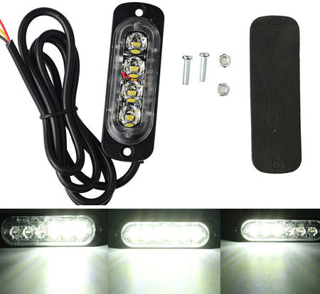 Feu de pénétration signalisation flash 12/24V 12W à 4 LED - Blanc
Lampe de signalisation d'urgence à 4 LED blanche, montée sur un boîtier en plastique noir avec câble d'alimentation. Accessoires de montage inclus.