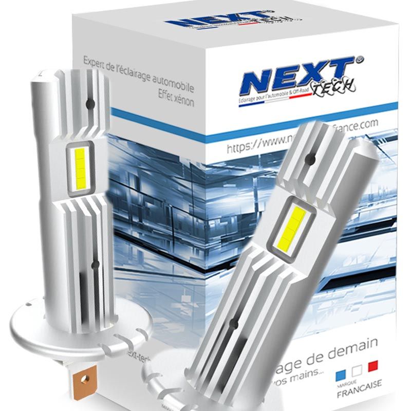 Ampoules LED H1 24V 55W en taille d'origine pour camion, proposées par la marque Next Tech Swiss, avec leur emballage blanc et bleu visible dans l'image.